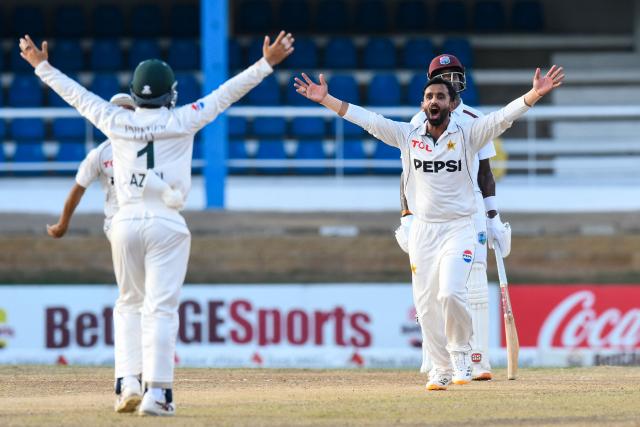 Bowler Ali Usman (R) of Pakistan celebrates after he caught and bowled batter Roston Chase (unseen) of West Indies during the third day of the second Test match between West Indies and Pakistan at Queen's Park Oval in Port of Spain, Trinidad and Tobago, on August 4, 2026. (Photo by Randy Brooks / AFP)