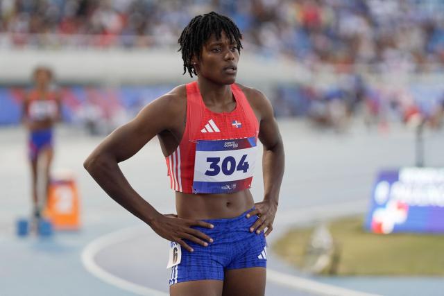 Dominican Republic's Marileidy Paulino looks on before competing in the women's 400m semifinal, heat 1, during the XXV Central American and Caribbean Games at the Felix Sanchez Olympic Stadium in Santo Domingo on August 3, 2026. (Photo by Francesco SPOTORNO / AFP)