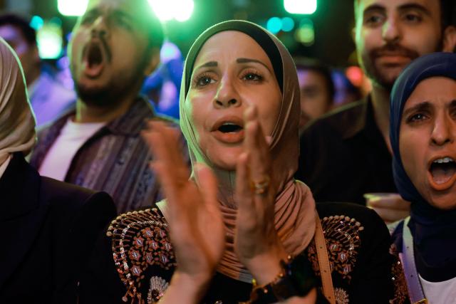 Supporters watch election results during Democratic US Senate candidate Abdul El-Sayed's election night event at The Majestic Theatre in Detroit, Michigan, on August 4, 2026. El-Sayed is hoping to defeat US Representative Haley Stevens in the Democratic primary to advance to the general election in November. The candidates are vying for Michigan's US Senate seat to replace retiring Democratic Senator Gary Peters. (Photo by JEFF KOWALSKY / AFP)