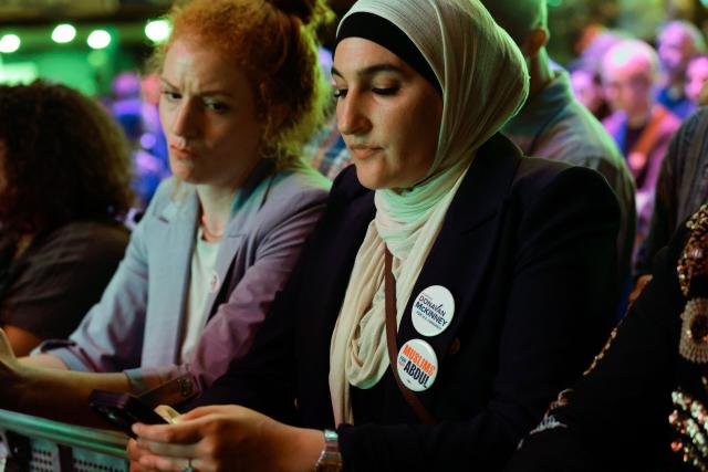 Supporters watch election results during Democratic US Senate candidate Abdul El-Sayed's election night event at The Majestic Theatre in Detroit, Michigan, on August 4, 2026. El-Sayed is hoping to defeat US Representative Haley Stevens in the Democratic primary to advance to the general election in November. The candidates are vying for Michigan's US Senate seat to replace retiring Democratic Senator Gary Peters. (Photo by JEFF KOWALSKY / AFP)