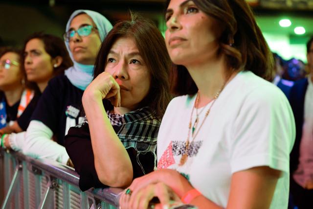 Supporters watch election results during Democratic US Senate candidate Abdul El-Sayed's election night event at The Majestic Theatre in Detroit, Michigan, on August 4, 2026. El-Sayed is hoping to defeat US Representative Haley Stevens in the Democratic primary to advance to the general election in November. The candidates are vying for Michigan's US Senate seat to replace retiring Democratic Senator Gary Peters. (Photo by JEFF KOWALSKY / AFP)