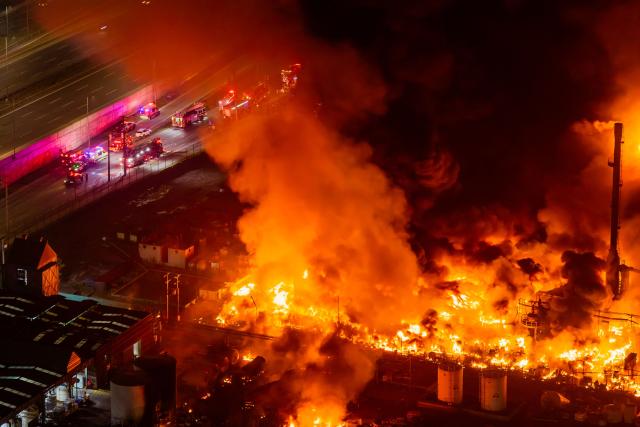 This aerial view shows a large fire at a chemical plant in the Quilicura commune of Santiago on August 4, 2026. (Photo by Javier TORRES / AFP)