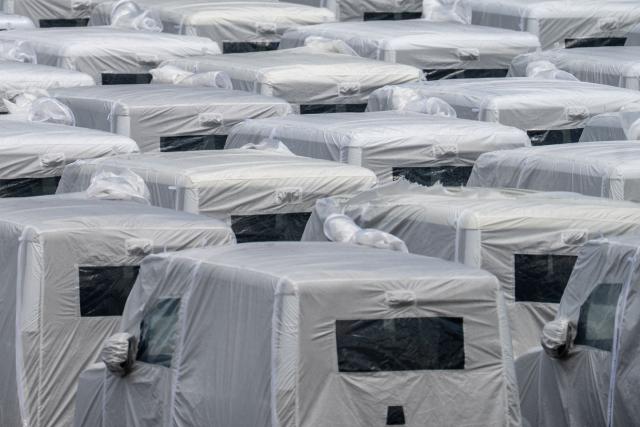 New BYD vehicles are parked at Daikoku Pier in Yokohama on August 5, 2026. (Photo by Philip FONG / AFP)