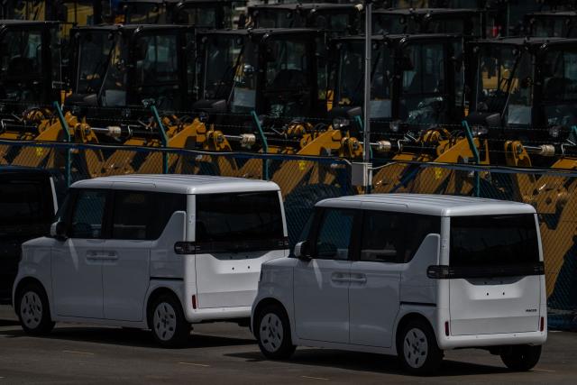 New BYD vehicles are parked at Daikoku Pier in Yokohama on August 5, 2026. (Photo by Philip FONG / AFP)