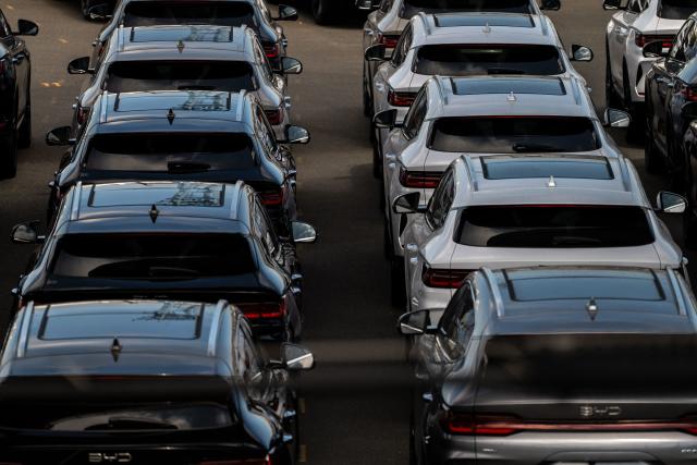 New BYD vehicles are parked at Daikoku Pier in Yokohama on August 5, 2026. (Photo by Philip FONG / AFP)