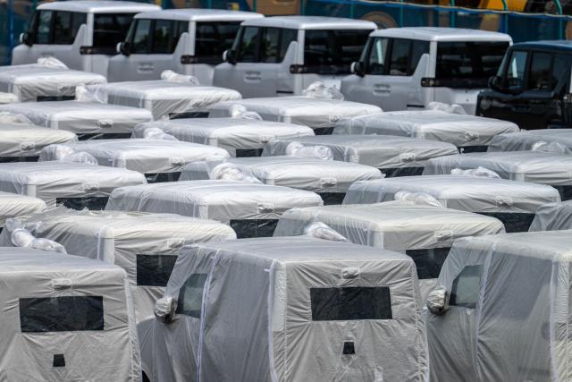New BYD vehicles are parked at Daikoku Pier in Yokohama on August 5, 2026. (Photo by Philip FONG / AFP)