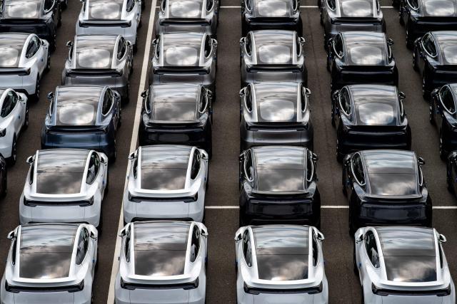 New Tesla vehicles are parked at Daikoku Pier in Yokohama on August 5, 2026. (Photo by Philip FONG / AFP)