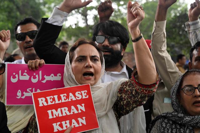 Pakistan Tehreek-e-Insaf (PTI) party supporter shout slogans during a protest demanding the release of their jailed leader and the country's former Prime Minister Imran Khan, in Lahore on August 5, 2026. (Photo by Arif ALI / AFP)