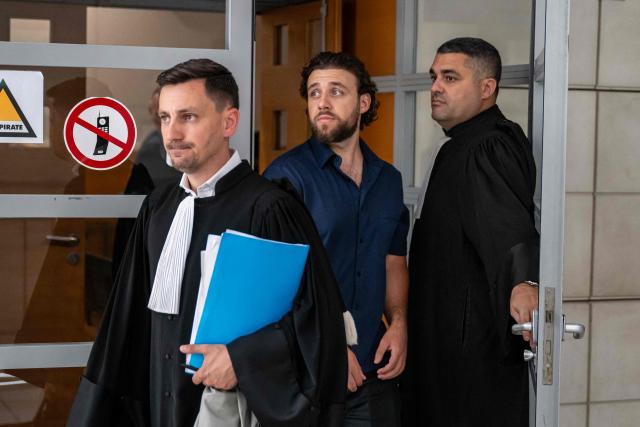 French streamer Owen Cenazandotti (R), known as Naruto, flanked by his lawyer Fabien Carles (L) leaves the courthouse of Nice, French riviera, on August 5, 2026 after the deliberation of his trial, along with fellow streamer Safine Hamadi, known as Safine, over allegations of violence whose partner Raphael Graven, known online as Jean Pormanove, died during a live stream in August 2025. On August 5, 2026, the Criminal Court of Nice sentenced the two streamers Naruto and Safine to suspended prison terms, a fine and a six-month "digital ban" after they were tried over online violence and humiliation that preceded the death of Jean Pormanove in August 2025. (Photo by Miguel MEDINA / AFP)