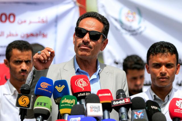 Khaled al-Shaif, director of Sanaa International Airport, speaks at a press conference in Sanaa on August 5, 2026, regarding demands to reopen the airport and to allow commercial flights to the Yemeni capital. (Photo by Mohammed HUWAIS / AFP)