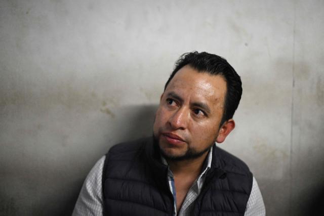 (FILES) Guatemalan Vice-Minister of Energy and Mines Luis Pacheco looks on as he arrives at the court after being arrested on charges of terrorism and other crimes in Guatemala City on April 23, 2025. A Guatemalan criminal court judge granted house arrest on August 4, 2026 to two indigenous leaders deemed “prisoners of conscience” by Amnesty International, following 15 months in pre-trial detention for leading protests against the former Attorney General, Consuelo Porras. The Mayan leaders Luis Pacheco – now Deputy Minister for Energy and Mines – and Hector Chaclan were arrested in April 2025 by anti-terrorism officers from Porras, a year and a half after taking part in demonstrations that included roadblocks. (Photo by JOHAN ORDONEZ / AFP)