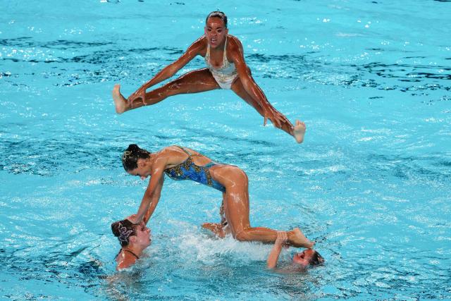 Portugal's team compete in the acrobatics artistic swimming final event during the LEN European Aquatics Championships, at the Olympic Aquatics Centre in Saint-Denis, northeastern suburbs of Paris, on August 5, 2026. (Photo by Dimitar DILKOFF / AFP)