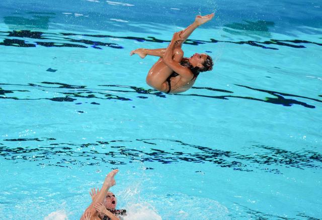 Neutral Athletes B's team Team competes in the acrobatics artistic swimming final event during the LEN European Aquatics Championships, at the Olympic Aquatics Centre in Saint-Denis, northeastern suburbs of Paris, on August 5, 2026. (Photo by Dimitar DILKOFF / AFP)