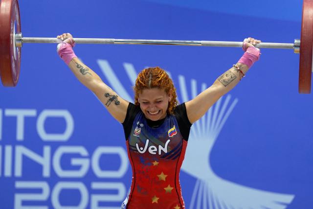 Venezuela's Patricia Mercado competes in the women's 48Kg weightlifting event during the XXV Central American and Caribbean Games in Santo Domingo on August 5, 2026. (Photo by Francesco SPOTORNO / AFP)