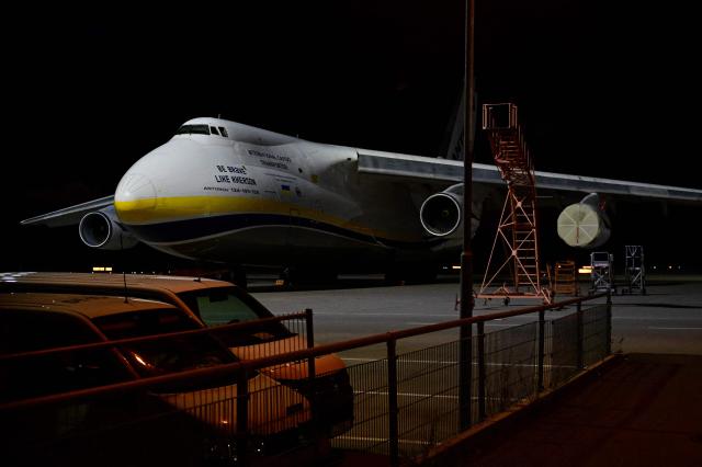 An Ukrainian "Antonov" cargo plane is pictured on August 5, 2026 at the German airport Leipzig-Halle in Schkeuditz, eastern Germany, after an explosives-laden drone was found there the night before. German police deployed a bomb disposal robot at the airport after a drone was found near a Ukrainian-flagged cargo plane overnight, also forcing the diversion of numerous flights. Another aircraft, which had to abort its scheduled landing at Leipzig-Halle airport, then collided mid-air with an unknown object several kilometres away but later landed safely, the government said. The airport in eastern Germany plays a key role in the transport of military goods, including by the German military and NATO allies, and also serves as a base for Ukraine's Antonov Airlines (Photo by John MACDOUGALL / AFP)