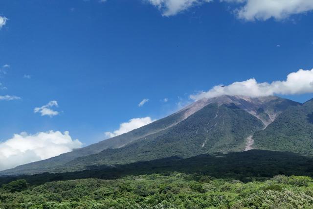 The Fuego volcano is seen in San Juan Alotenango on August 5, 2026, after a powerful eruption forced evacuations in the area. The eruption of Guatemala's Fuego volcano has ended after forcing a mass evacuation, the country's volcanological institute said on August 5, 2026. (Photo by Johan ORDONEZ / AFP)
