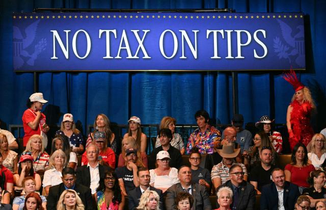 Attendees wait for US President Donald Trump to arrive to speak at an event about his administration's recent tax-relief initiative at the Red Rock Casino Resort and Spa in Las Vegas, Nevada, on August 5, 2026. (Photo by Jim WATSON / AFP)