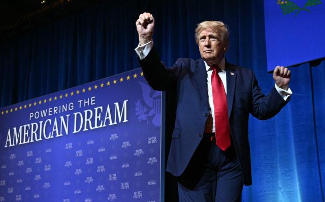 US President Donald Trump dances as he leaves the stage after speaking at an event promoting his administration's recent tax-relief initiative at Red Rock Casino Resort and Spa in Las Vegas, Nevada, on August 5, 2026. (Photo by Jim WATSON / AFP)