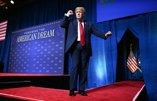 US President Donald Trump dances as he leaves the stage after speaking at an event promoting his administration's recent tax-relief initiative at Red Rock Casino Resort and Spa in Las Vegas, Nevada, on August 5, 2026. (Photo by Jim WATSON / AFP)