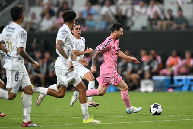 Inter Miami's Argentine forward #10 Lionel Messi controls the ball followed by Atletico de San Luis players during the Leagues Cup 2026 group-stage football match between Inter Miami CF and Atletico de San Luis at Nu Stadium in Miami, Florida, on August 5, 2026. (Photo by CHANDAN KHANNA / AFP)
