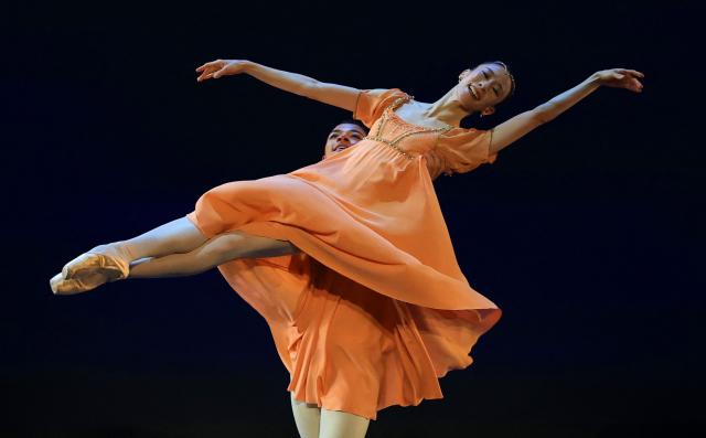 Dancers Guillaume Diop and Sae Eun Park from Paris Opera Ballet perform a scene from “Romeo and Juliet (Excerpt)” as part of The Joyce Ballet Festival at The Joyce Theater in New York, on August 5, 2026. The two-week Joyce Ballet Festival of 2026 is curated by US ballet dancer Misty Copeland. (Photo by TIMOTHY A. CLARY / AFP)