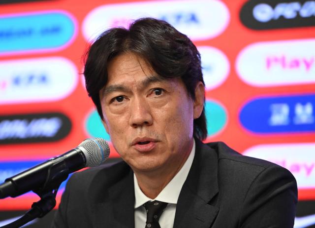 (FILES) South Korea's national football team head coach Hong Myung-bo speaks during a press conference to announce the South Korean squad for the 2026 FIFA World Cup football tournament, in Seoul on May 16, 2026. Police conducted "search and seizure operations" at the Korea Football Association's offices, probing allegations of "obstruction of business" in the recruitment of former coach Hong Myung-bo, a police spokesman told AFP on August 6, 2026. (Photo by Jung Yeon-je / AFP)
