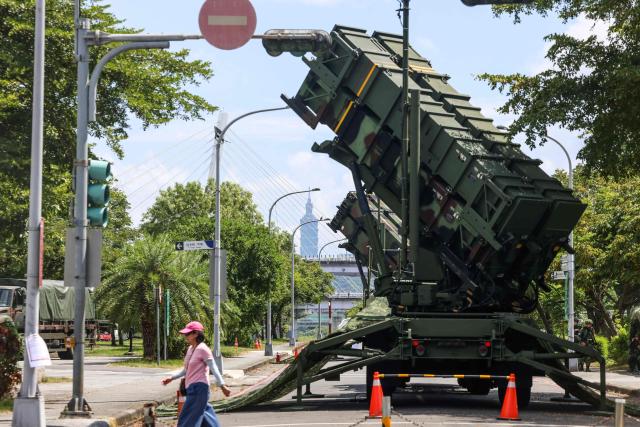 Taiwanese military Patriot missile systems are deployed on a local park with Taipei 101 visible in the background during the annual Han Kuang military exercise in New Taipei City on August 6, 2026 (Photo by I-Hwa Cheng / AFP)