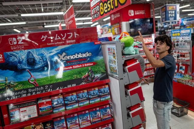 A customer visits the gaming section for Nintendo products at a shop in Tokyo on August 6, 2026. (Photo by Philip FONG / AFP)