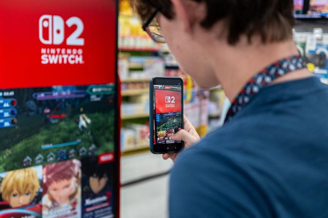 A customer visits the gaming section for Nintendo products at a shop in Tokyo on August 6, 2026. (Photo by Philip FONG / AFP)