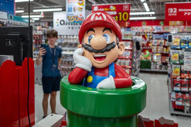 A customer visits the gaming section for Nintendo products at a shop in Tokyo on August 6, 2026. (Photo by Philip FONG / AFP)