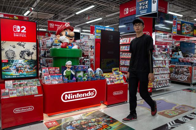 A customer visits the gaming section for Nintendo products at a shop in Tokyo on August 6, 2026. (Photo by Philip FONG / AFP)