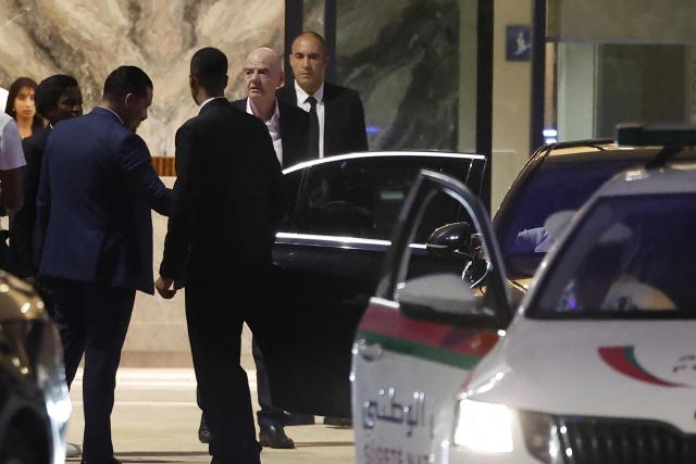 FIFA President Gianni Infantino (2nd R) leaves Al-Madina Stadium in Rabat following the 2026 Women's Africa Cup of Nations match between Malawi and Zambia on August 5, 2026. Infantino, under fire for a now shelved plan to open the World Cup to private investment, earlier held emergency talks in Morocco with directors of the world football governing body.
FIFA then issued an apology while reaffirming its "full support" for Infantino. In a statement, the leadership acknowledged "that errors were also made after the proposal was leaked to media". (Photo by Abdel Majid BZIOUAT / AFP)