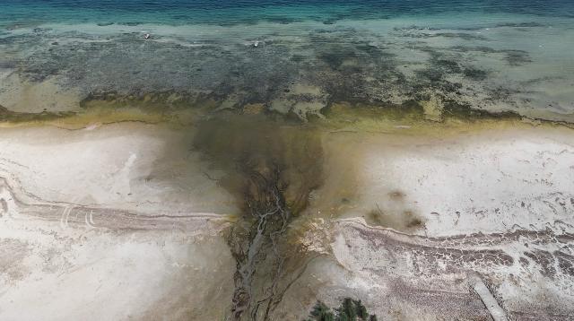 This aerial photograph shows sandbanks exposed by the receding waters of Lake Maggiore, in Ispa, northern Italy, on August 6, 2026. (Photo by Stefano RELLANDINI / AFP)
