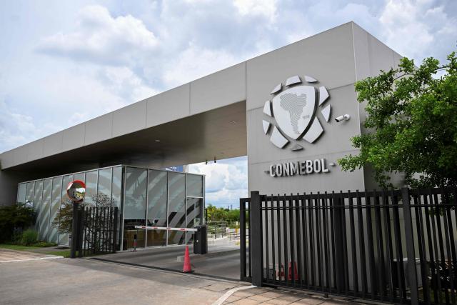 (FILES) View of the South American Football Confederation (Conmebol) headquarters in Luque, Paraguay, on January 16, 2026. The South American Football Confederation (CONMEBOL) welcomed FIFA's decision on August 6, 2026, to withdraw its FIFA Forward Enterprise project and expressed its "concern over the repeated unilateral actions" taken to promote it, according to a statement. (Photo by Luis ROBAYO / AFP)