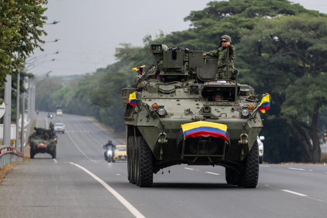 A Colombian Army armored vehicle patrols along a highway near Alfonso Bonilla Aragón International Airport on the eve of the inauguration of Colombian president-elect Abelardo de la Espriella in Cali, Colombia, on August 6, 2026. (Photo by Luis ACOSTA / AFP)
