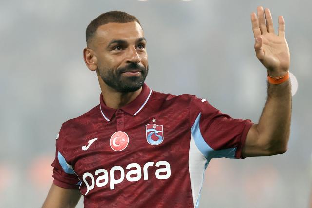 Trabzonspor's Egyptian forward Mohamed Salah gestures during his signing cerenomy at the Papara Park Stadium in Trabzon on August 6, 2026. Former Liverpool star Mohamed Salah on August 6, 2026 signed a two-year contract with Turkish club Trabzonspor after leaving the Premier League giants at the end of his contract. (Photo by Nurgul GUNAYDIN / AFP)