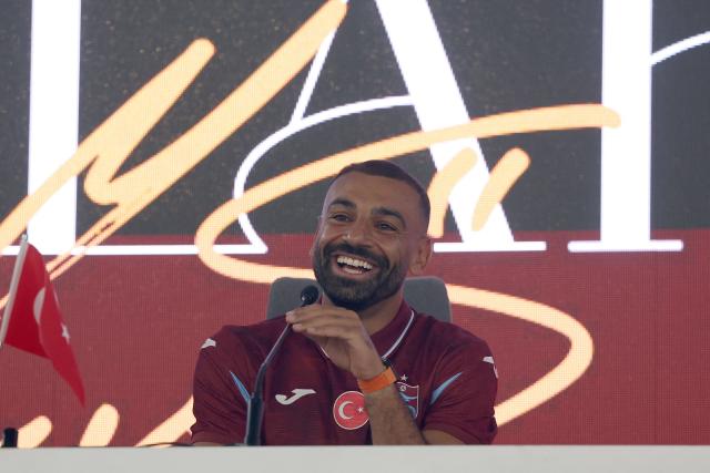 Trabzonspor's Egyptian forward Mohamed Salah speaks during his signing cerenomy at the Papara Park Stadium in Trabzon on August 6, 2026. Former Liverpool star Mohamed Salah on August 6, 2026 signed a two-year contract with Turkish club Trabzonspor after leaving the Premier League giants at the end of his contract. (Photo by Nurgul GUNAYDIN / AFP)