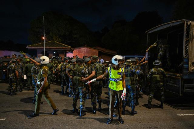Sri Lanka Air Force soldiers take up positions outside  Sri Lanka’s main Welikada Prison in the capital Colombo on August 7, 2026, following reports that some prisoners were staging a protest inside. There have been two prison riots since early July, in which 10 guards and 23 inmates have been killed. (Photo by Ishara S. KODIKARA / AFP)