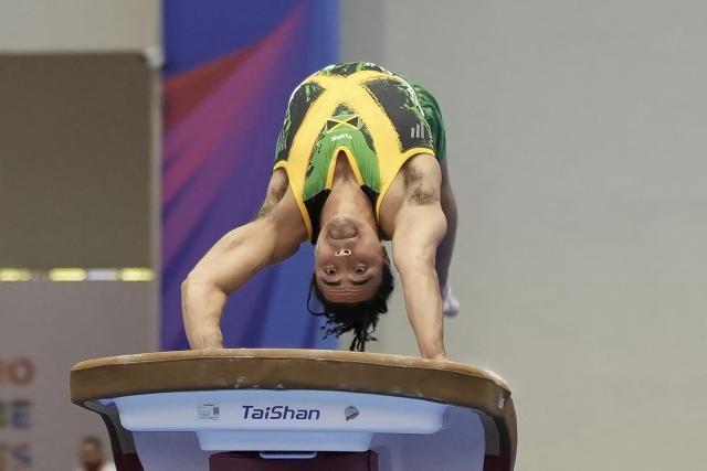 Jamaica's Clayton Bell competes in the men's vault final during the XXV Central American and Caribbean Games in Santo Domingo on August 6, 2026. (Photo by Francesco SPOTORNO / AFP)