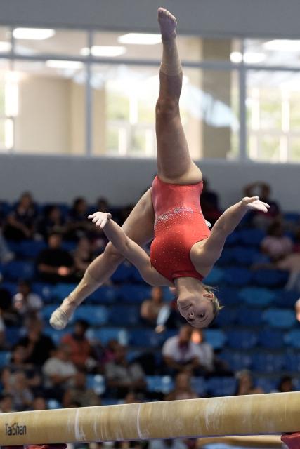 Costa Rica's Samantha Marin competes in the women's balance beam final during the XXV Central American and Caribbean Games in Santo Domingo on August 6, 2026. (Photo by Francesco SPOTORNO / AFP)