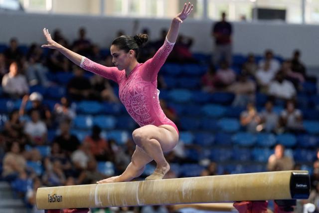 Mexico's Paulina Guerra competes in the women's balance beam final during the XXV Central American and Caribbean Games in Santo Domingo on August 6, 2026. (Photo by Francesco SPOTORNO / AFP)