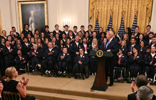 US President Donald Trump speaks during an event welcoming Team USA Olympic and Paralympic winter athletes in the East Room of the White House in Washington, DC, on August 6, 2026. (Photo by Jim WATSON / AFP)