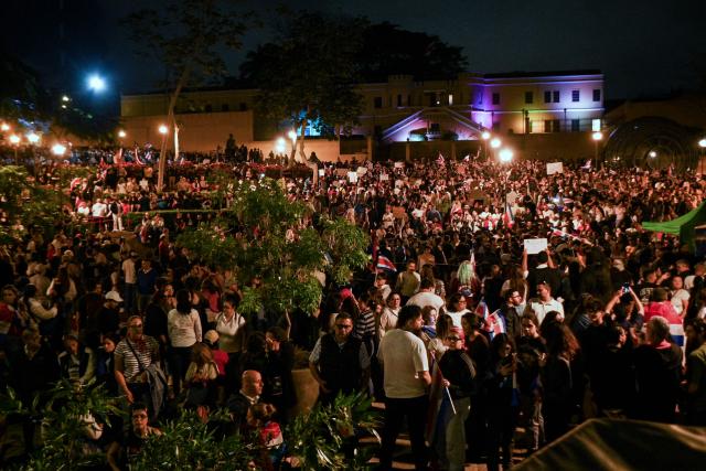 People take part in a protest in defense of the judiciary, the separation of powers and the rule of law in San Jose on August 6, 2026, amid concerns over proposed judicial reforms by President Laura Fernandez. Thousands of people protested in Costa Rica on August 6 against what they see as a threat by President Laura Fernandez to the country's judiciary, in a nation widely regarded as one of the region's most stable democracies. (Photo by ALEJANDRA VALENZUELA / AFP)