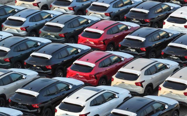 Chevrolet cars manufactured by SAIC-GM are ready for export in Yantai city, eastern China's Shandong province on August 7, 2026. (Photo by CN-STR / AFP) / China OUT