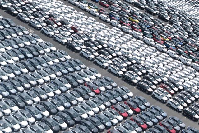 Cars for export including BYD, Cherry and SAIC productions are seen at Shanghai port in Shanghai on August 7, 2026. (Photo by CN-STR / AFP) / China OUT