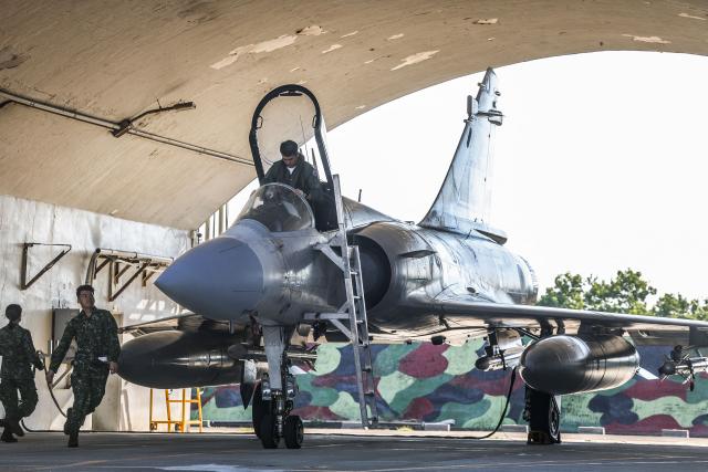 A Taiwanese Air Force Mirage 2000 fighter jet is prepared for a scramble mission as part of the annual Han Kuang military exercise at Hsinchu Air Force base in Hsinchu on August 7, 2026. (Photo by I-Hwa Cheng / AFP)