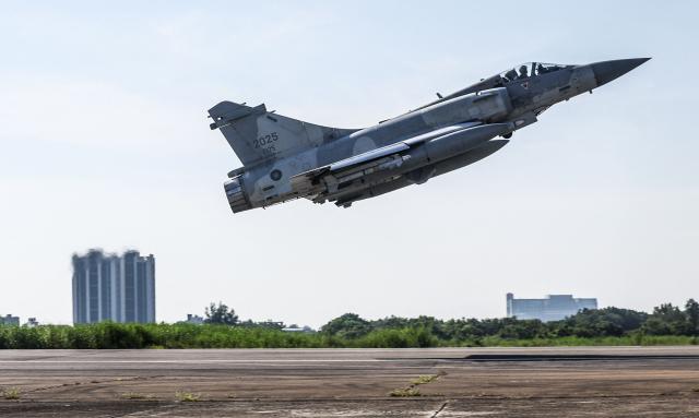A Taiwanese Air Force Mirage 2000 fighter jet takes off at Hsinchu Air Force base as part of the annual Han Kuang military exercise in Hsinchu on August 7, 2026. (Photo by I-Hwa Cheng / AFP)