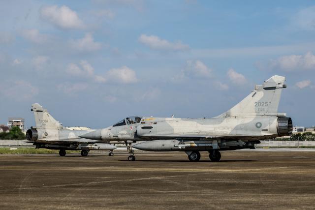 Taiwanese Air Force Mirage 2000 fighter jets prepared for a scramble mission as part of the annual Han Kuang military exercise in Hsinchu on August 7, 2026. (Photo by I-Hwa Cheng / AFP)