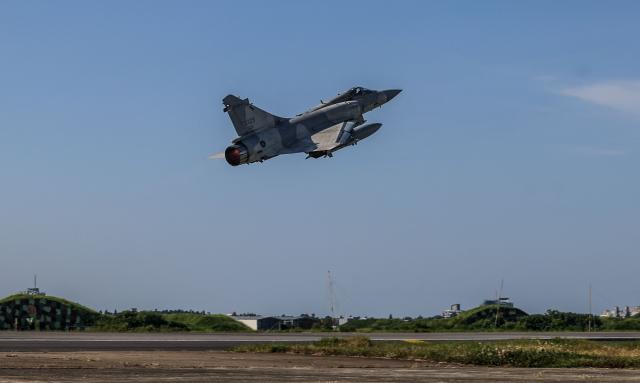 A Taiwanese Air Force Mirage 2000 fighter jet takes off at Hsinchu Air Force base as part of the annual Han Kuang military exercise in Hsinchu on August 7, 2026. (Photo by I-Hwa Cheng / AFP)