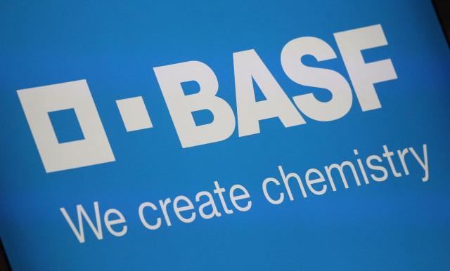 (FILES) The logo of German chemical giant BASF is pictured at its headquarters in Ludwigshafen, western Germany, on February 24, 2023. The Rouen Normandy Metropole has filed a complaint against BASF over its “massive” discharges of persistent pollutants – specifically TFA – into the Seine, it announced on August 7, 2026. (Photo by DANIEL ROLAND / AFP)